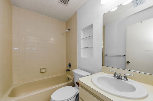 1902 Elaine Dr, Clearwater, FL 33760 - full bath with a textured ceiling, vanity, shower / bath combination, and built in features