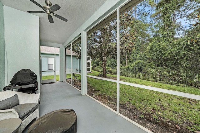 11220 Paradise Pointe Way, New Port Richey, FL 34654 - sunroom / solarium featuring a ceiling fan