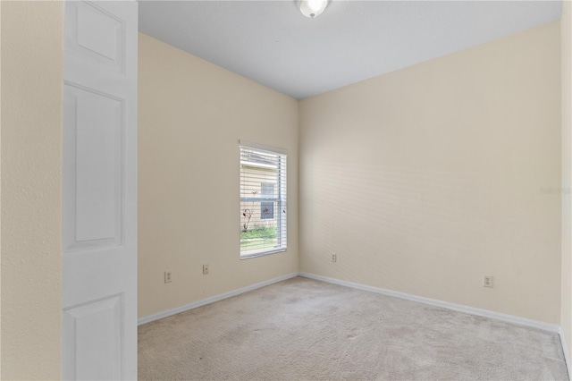 12631 Chenwood Ave, Hudson, FL 34669 - spare room with light colored carpet and baseboards