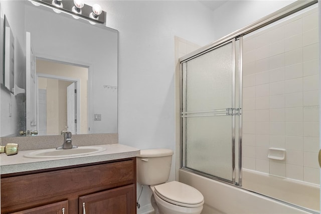 12631 Chenwood Ave, Hudson, FL 34669 - full bathroom featuring vanity and shower / bath combination with glass door