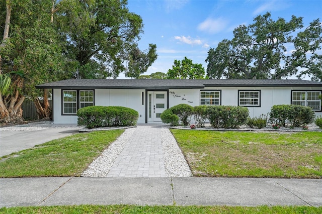 4704 W Fairview Hts, Tampa, FL 33616 - ranch-style house featuring a front yard