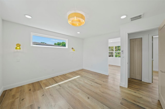 4704 W Fairview Hts, Tampa, FL 33616 - empty room featuring light wood-style floors and recessed lighting