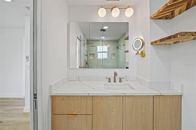 4704 W Fairview Hts, Tampa, FL 33616 - full bath with vanity, a stall shower, and wood finished floors