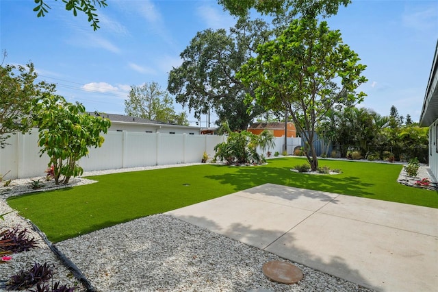 4704 W Fairview Hts, Tampa, FL 33616 - fenced backyard with a patio