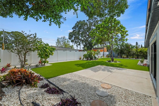 4704 W Fairview Hts, Tampa, FL 33616 - fenced backyard featuring a patio