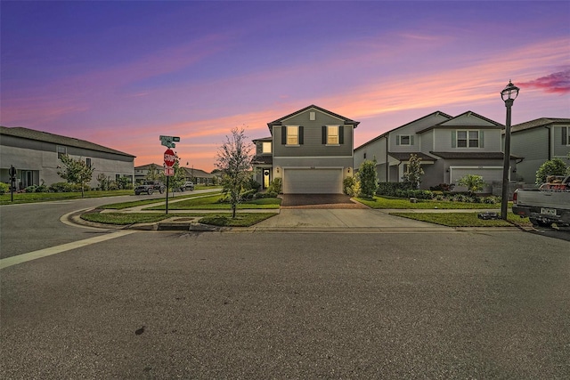 4608 Emprise Way, Land O Lakes, FL 34638 - traditional home with an attached garage and concrete driveway