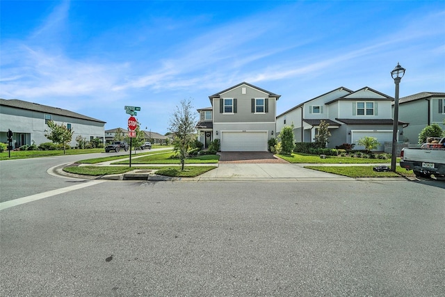 4608 Emprise Way, Land O Lakes, FL 34638 - traditional-style house featuring a garage, driveway, a residential view, and a front yard