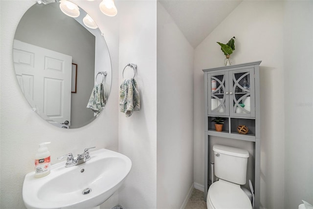 4608 Emprise Way, Land O Lakes, FL 34638 - half bath featuring a sink and lofted ceiling
