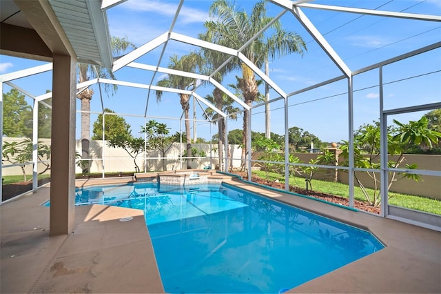 10101 Paddock Oaks Dr, Riverview, FL 33569 - view of pool featuring a fenced backyard, glass enclosure, a patio area, and a pool with connected hot tub
