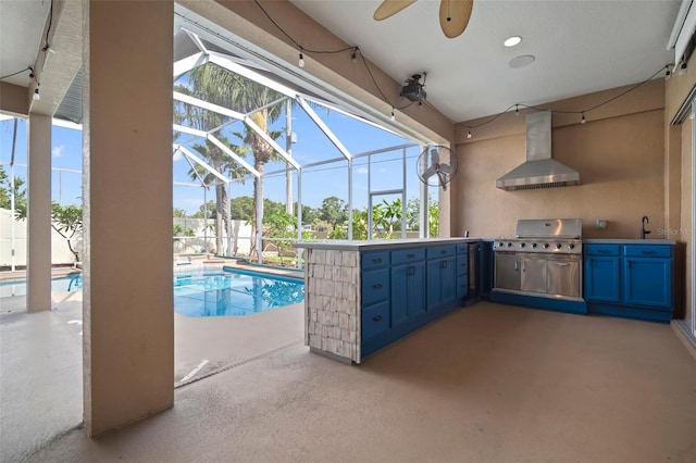 10101 Paddock Oaks Dr, Riverview, FL 33569 - view of pool featuring ceiling fan, exterior kitchen, a patio area, and glass enclosure