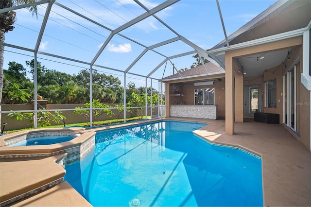 10101 Paddock Oaks Dr, Riverview, FL 33569 - view of swimming pool with a patio, ceiling fan, glass enclosure, and a pool with connected hot tub