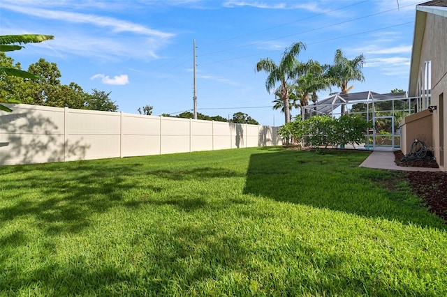 10101 Paddock Oaks Dr, Riverview, FL 33569 - view of yard featuring a lanai