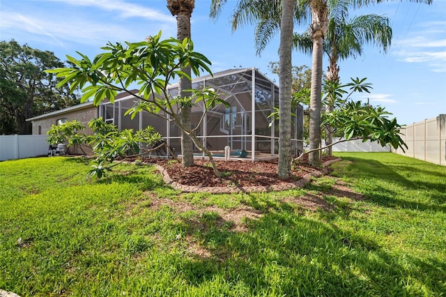 10101 Paddock Oaks Dr, Riverview, FL 33569 - fenced backyard featuring a lanai