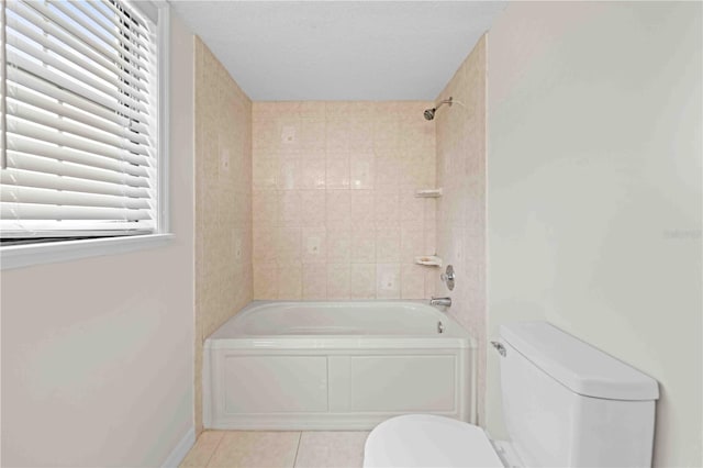 2141 Coachman Rd, Spring Hill, FL 34608 - bathroom featuring tile patterned floors and  shower combination