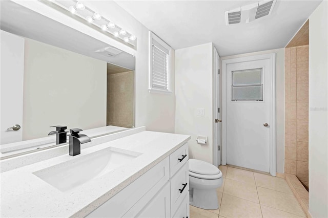 2141 Coachman Rd, Spring Hill, FL 34608 - full bath with vanity and tile patterned flooring