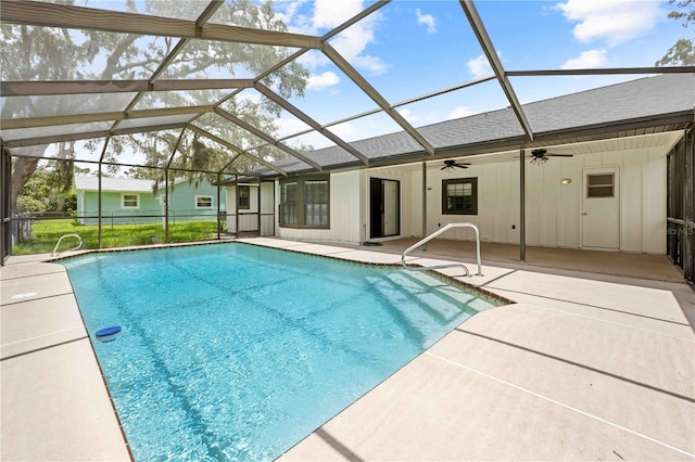 2141 Coachman Rd, Spring Hill, FL 34608 - swimming pool with a patio area, ceiling fan, and glass enclosure