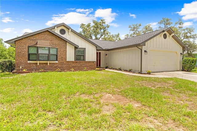 2141 Coachman Rd, Spring Hill, FL 34608 - single story home featuring board and batten siding, an attached garage, brick siding, driveway, and a front yard
