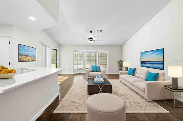 2141 Coachman Rd, Spring Hill, FL 34608 - living area with dark wood finished floors, ceiling fan, vaulted ceiling, and recessed lighting