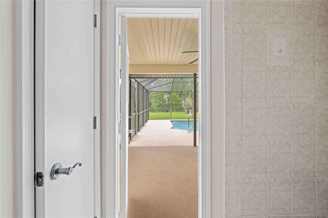 2141 Coachman Rd, Spring Hill, FL 34608 - doorway featuring carpet floors