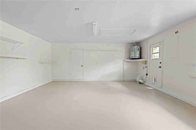 2141 Coachman Rd, Spring Hill, FL 34608 - garage featuring water heater