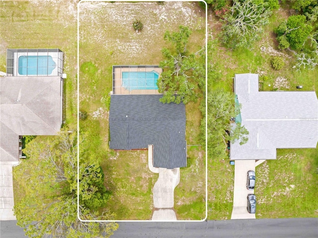 2141 Coachman Rd, Spring Hill, FL 34608 - bird's eye view of a pool area