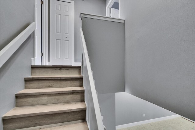 6601 121st Ave Unit I, Largo, FL 33773 - stairs with baseboards