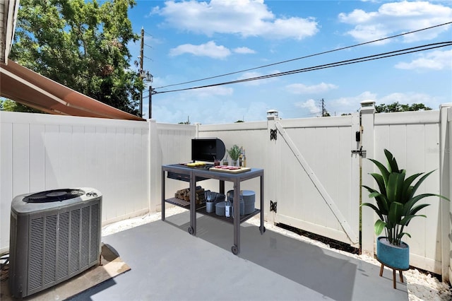 6601 121st Ave Unit I, Largo, FL 33773 - view of patio featuring a gate