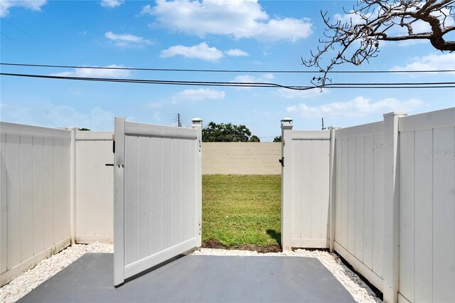 6601 121st Ave Unit I, Largo, FL 33773 - view of yard featuring a patio area