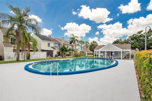 6601 121st Ave Unit I, Largo, FL 33773 - community pool with a residential view and a patio area
