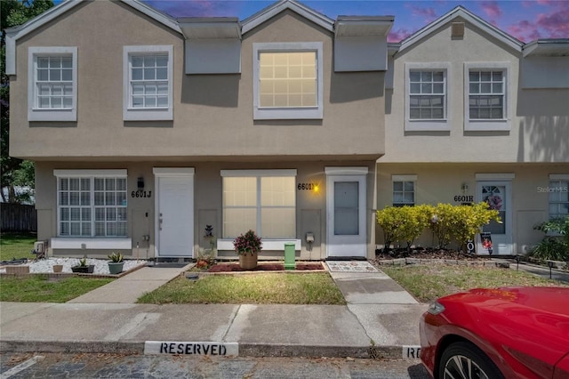 6601 121st Ave Unit I, Largo, FL 33773 - view of property featuring stucco siding