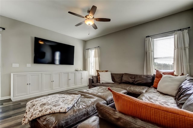 6648 Castle Green Pl, Zephyrhills, FL 33541 - living area with dark wood-type flooring, plenty of natural light, and a ceiling fan