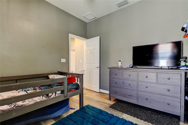 6648 Castle Green Pl, Zephyrhills, FL 33541 - bedroom featuring light wood-style floors