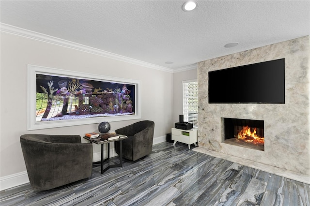 3663 Berger Rd, Lutz, FL 33548 - living room featuring crown molding, a fireplace, a textured ceiling, and wood finished floors