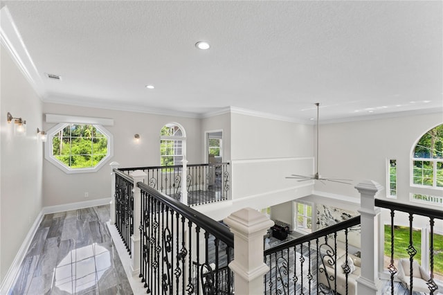 3663 Berger Rd, Lutz, FL 33548 - corridor with an upstairs landing, marble tiled flooring, recessed lighting, and a textured ceiling
