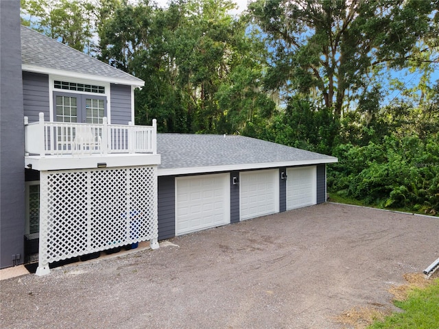 3663 Berger Rd, Lutz, FL 33548 - detached garage featuring view of scattered trees