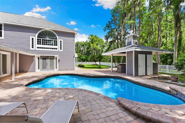 3663 Berger Rd, Lutz, FL 33548 - view of swimming pool featuring french doors and a patio area