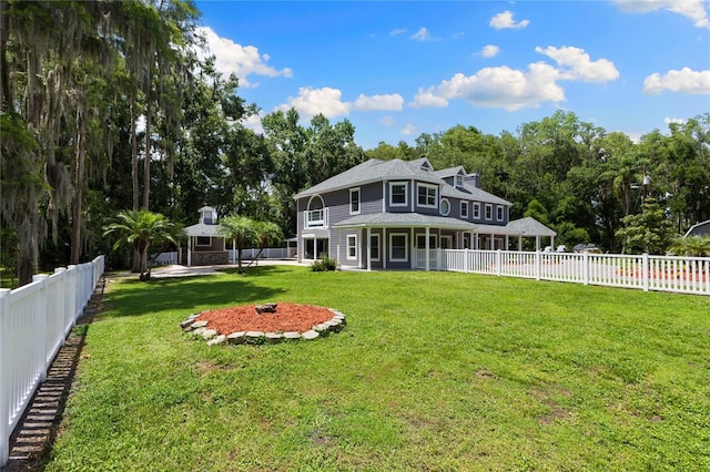 3663 Berger Rd, Lutz, FL 33548 - rear view of house with a gazebo and a fenced backyard