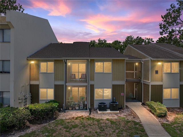 13285 Arbor Pointe Cir Unit 202, Tampa, FL 33617 - rear view of house with roof with shingles