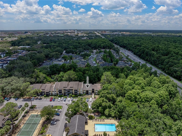 13285 Arbor Pointe Cir Unit 202, Tampa, FL 33617 - bird's eye view of a pool area and a forest
