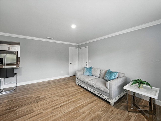 13285 Arbor Pointe Cir Unit 202, Tampa, FL 33617 - living area with ornamental molding and light wood-type flooring