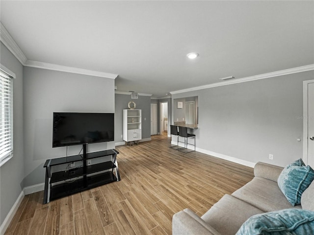 13285 Arbor Pointe Cir Unit 202, Tampa, FL 33617 - living room with crown molding, light wood-style floors, plenty of natural light, and recessed lighting
