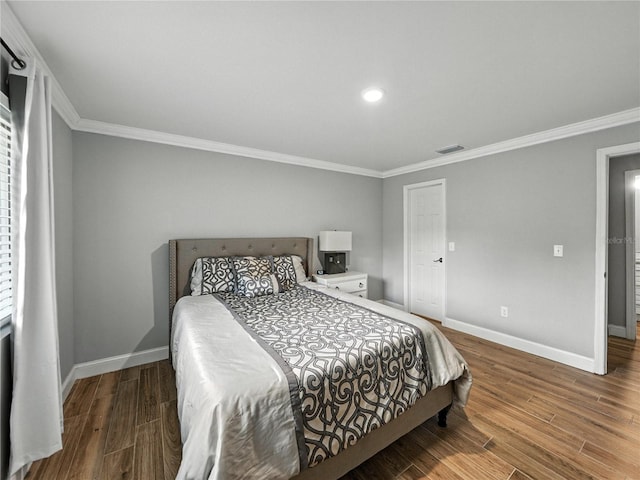 13285 Arbor Pointe Cir Unit 202, Tampa, FL 33617 - bedroom with wood finished floors, crown molding, and recessed lighting
