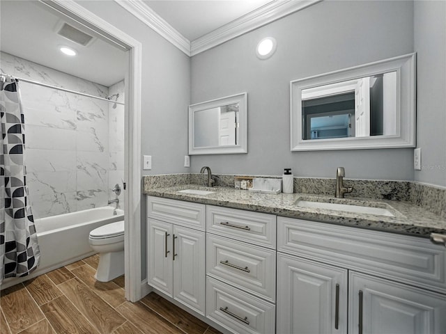 13285 Arbor Pointe Cir Unit 202, Tampa, FL 33617 - full bathroom featuring double vanity, crown molding, shower / bath combo with shower curtain, and wood finished floors