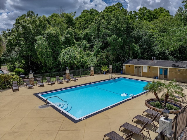 13285 Arbor Pointe Cir Unit 202, Tampa, FL 33617 - community pool with a patio area