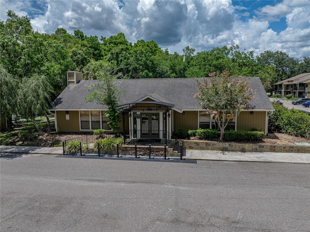 13285 Arbor Pointe Cir Unit 202, Tampa, FL 33617 - view of front of house with a chimney