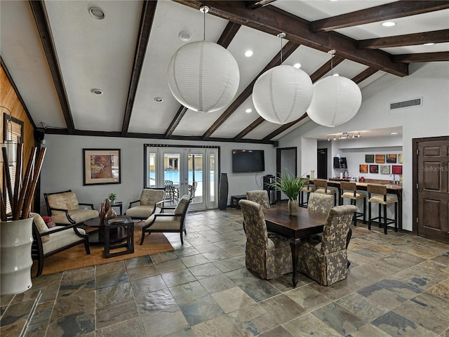 13285 Arbor Pointe Cir Unit 202, Tampa, FL 33617 - dining space with stone tile floors, recessed lighting, and french doors
