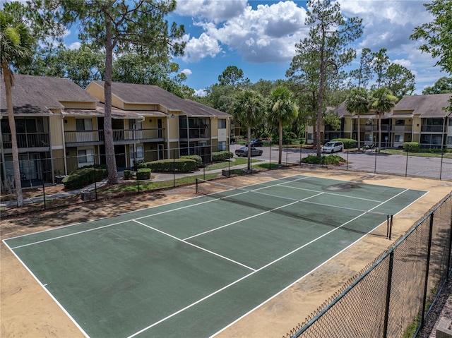 13285 Arbor Pointe Cir Unit 202, Tampa, FL 33617 - view of tennis court featuring a residential view