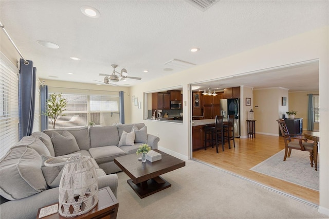 218 N Bay Hills Blvd, Safety Harbor, FL 34695 - living area with recessed lighting, light wood-type flooring, and a chandelier