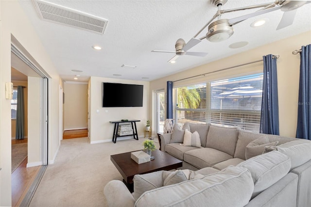 218 N Bay Hills Blvd, Safety Harbor, FL 34695 - living area featuring a ceiling fan, light carpet, recessed lighting, and a textured ceiling