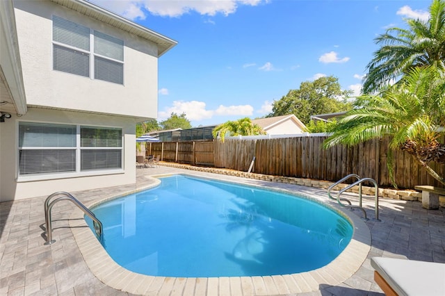 218 N Bay Hills Blvd, Safety Harbor, FL 34695 - view of swimming pool featuring a patio area and a fenced backyard